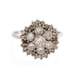 A diamond flower head cluster 18ct white gold ring, total diamond weight approximately 1.