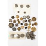 A collection of metal buttons, late 19th Century, some in the Art Nouveau style,