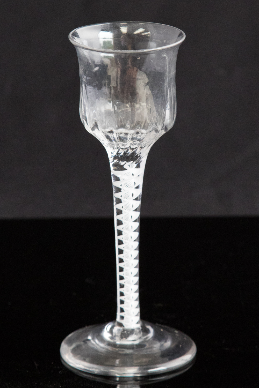 An 18th century wine glass, circa 1750, the double ogee,