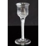 An 18th century wine glass, circa 1750, the double ogee,