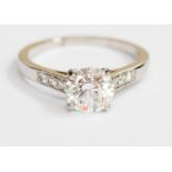A solitaire diamond white metal ring with GIA certificate,