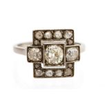 An Art Deco diamond square cluster ring, a total of fifteen round old cut diamonds,
