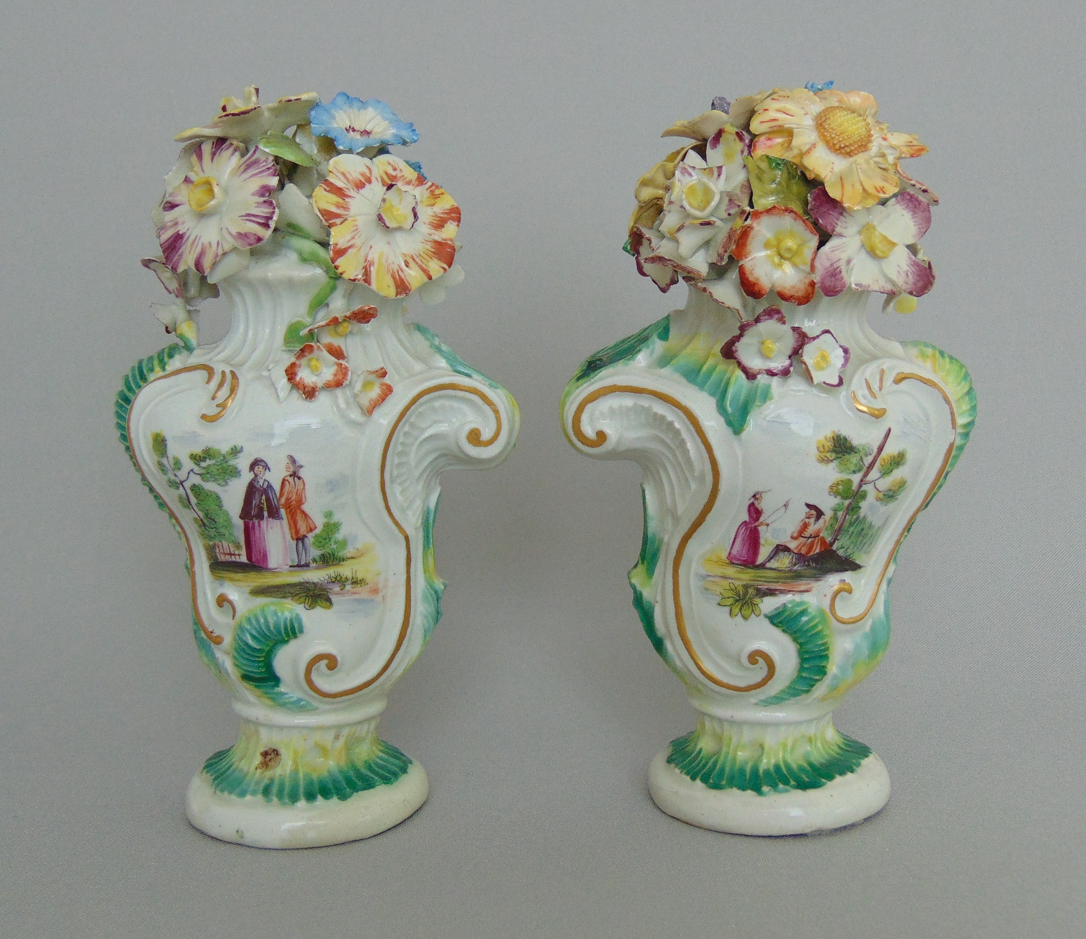 A pair of Derby Rococo vases,