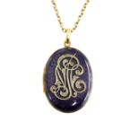 A Victorian diamond set guilloche purple enamelled locket and chain,