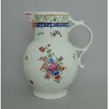 A Worcester cabbage leaf moulded jug, decorated with flower sprays and loop handle, circa 1775, 20.