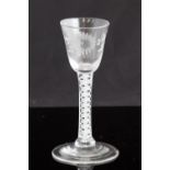 An 18th century wine glass, circa 1745,