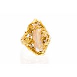 A baroque pearl and diamond yellow metal ring,