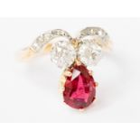 An early twentieth century ruby and diamond yellow metal dress ring,