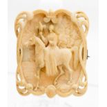 A French Dieppe carved ivory brooch depicting Lady with falcon on horseback