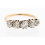 A diamond five stone yellow gold ring,