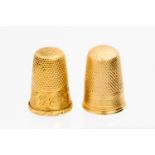 A Victorian gold thimble, chased with foliate band and initials G C,