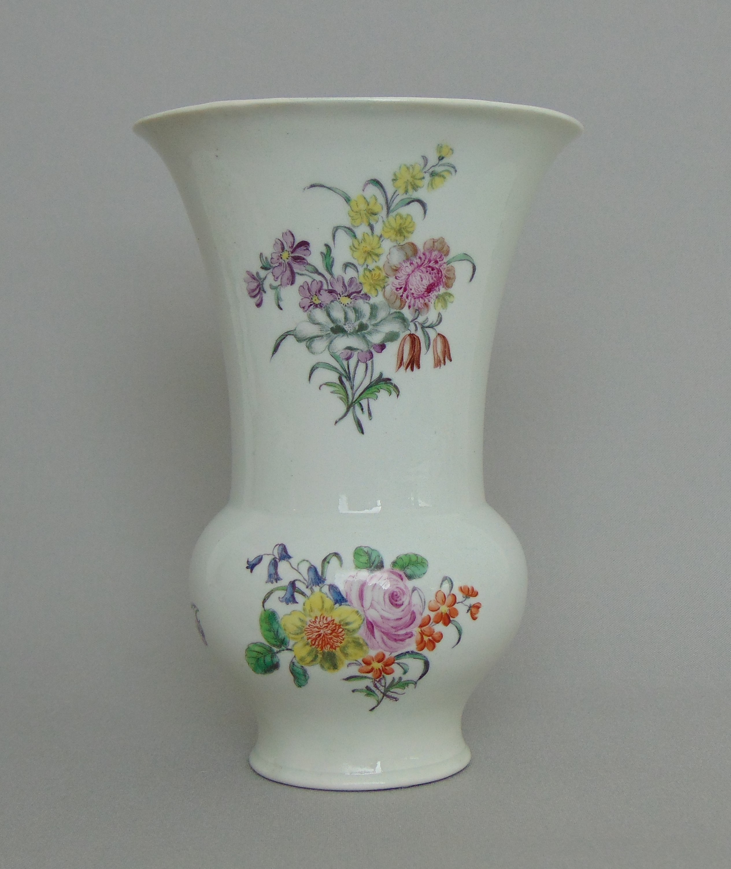 A Worcester Meissen style baluster shaped vase, painted with flowers, circa 1758,