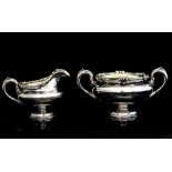 A matching William IV silver two handle sugar bowl and milk jug,