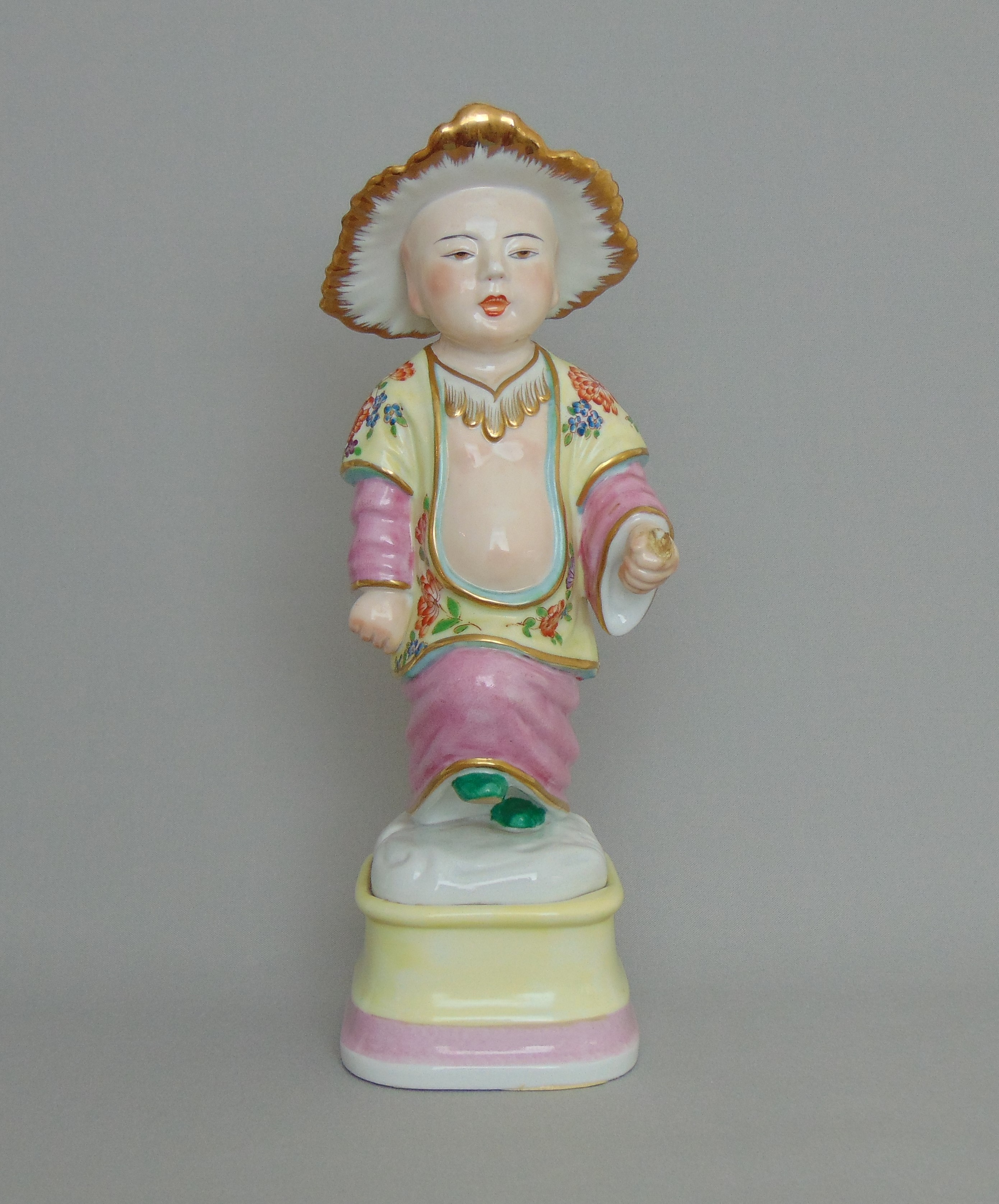 A Continental porcelain figure of a Chinaman in Meissen style, circa 20th Century,