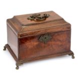 A George II and later flame mahogany tea caddy, circa 1750, caddy top with bronze swing handle,