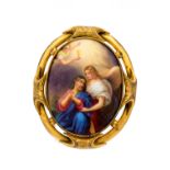 An oval Berlin porcelain plaque brooch, circa 1870, painted with a nativity scene, gilt metal mount,