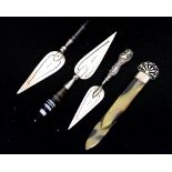 Three silver page markers, modelled in the form of trowels, two with agate handles,