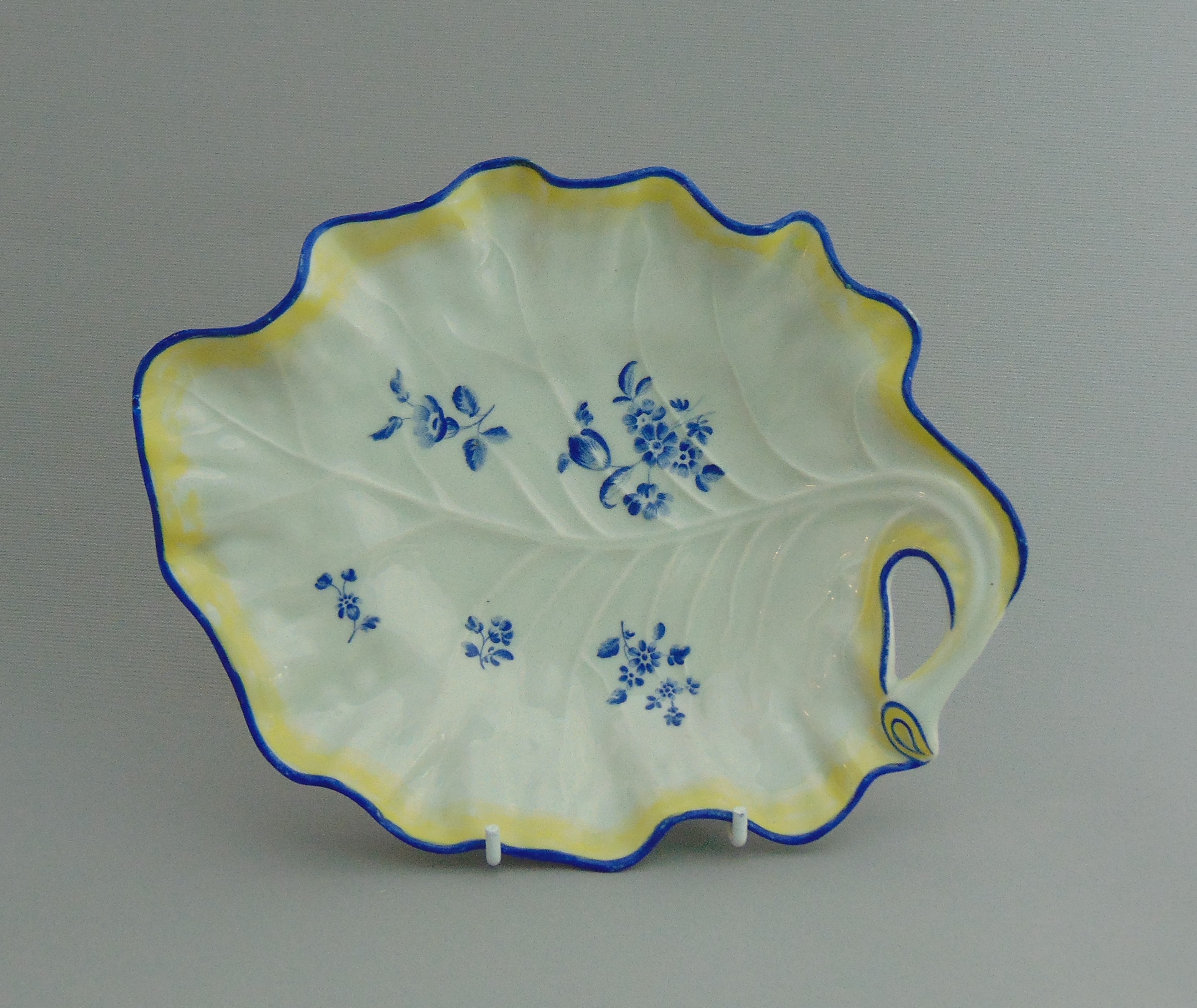 A Worcester cabbage leaf dish, decorated in dry blue enamel in the Giles Atelier, circa 1770,