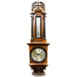 A Victorian Aesthetic walnut barometer and thermometer, by Negretti & Zambra,