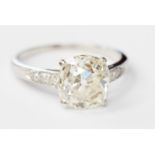 A diamond solitaire white metal ring,