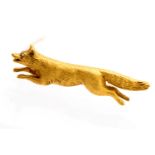 A yellow metal fox brooch set with diamond chip eye, approx 40mm, gross weight approx 6.