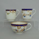 Three Worcester fluted cups,