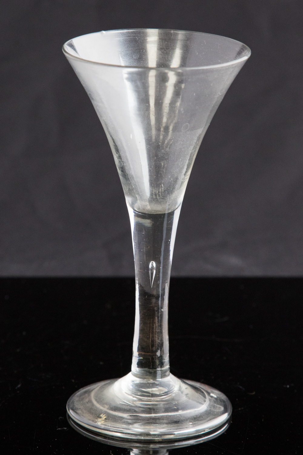 An 18th century wine glass, circa 1745,