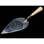 A Victorian silver presentation or foundation trowel, with turned ivory handle,