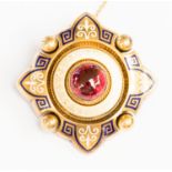 A Victorian garnet and enamel gold target brooch,
