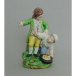 A Staffordshire pearlware group 'Bird Nesting', two boys on a grassy mound with a birds nest,