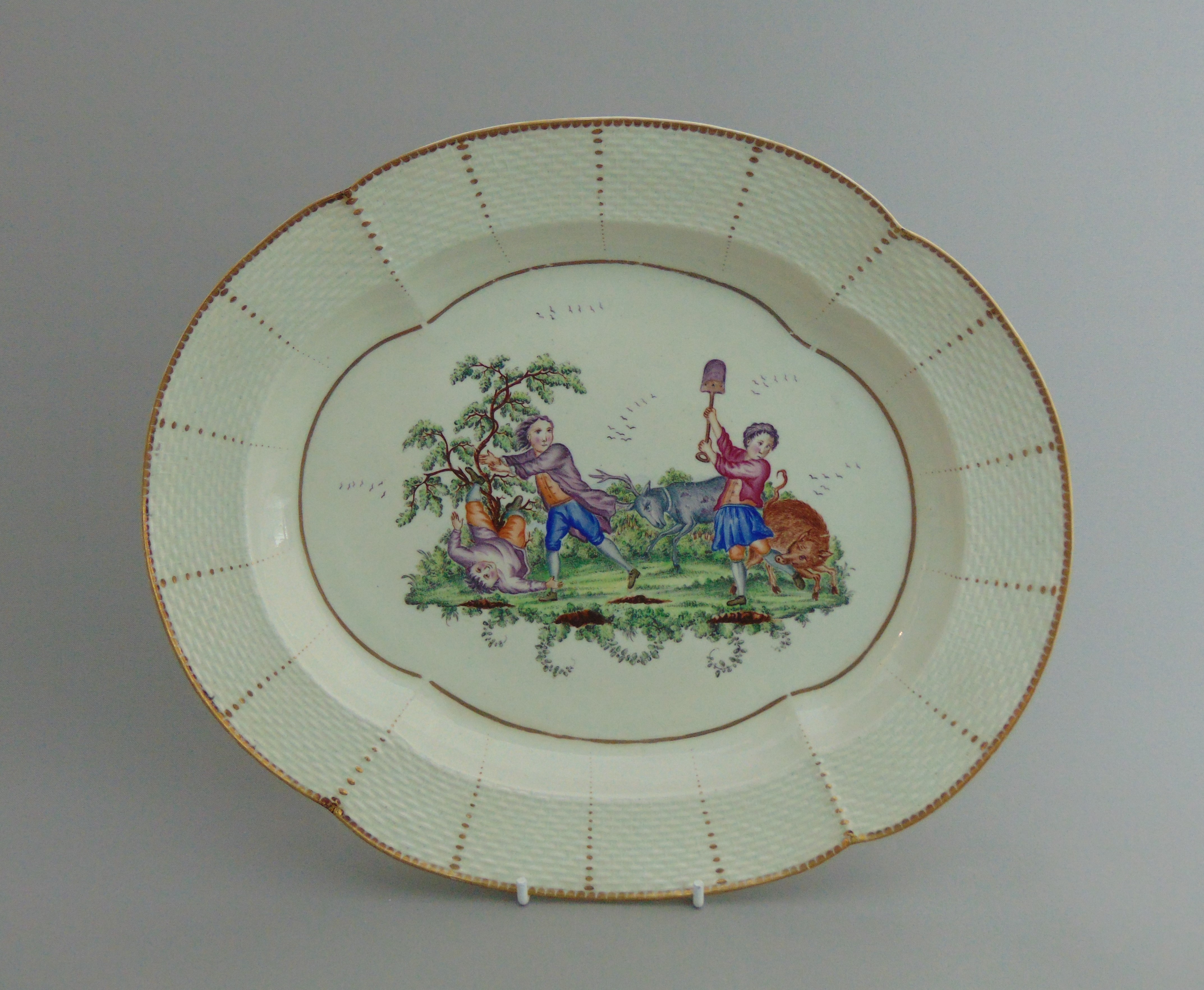 A rare large Worcester oval dish, with a painted scene,