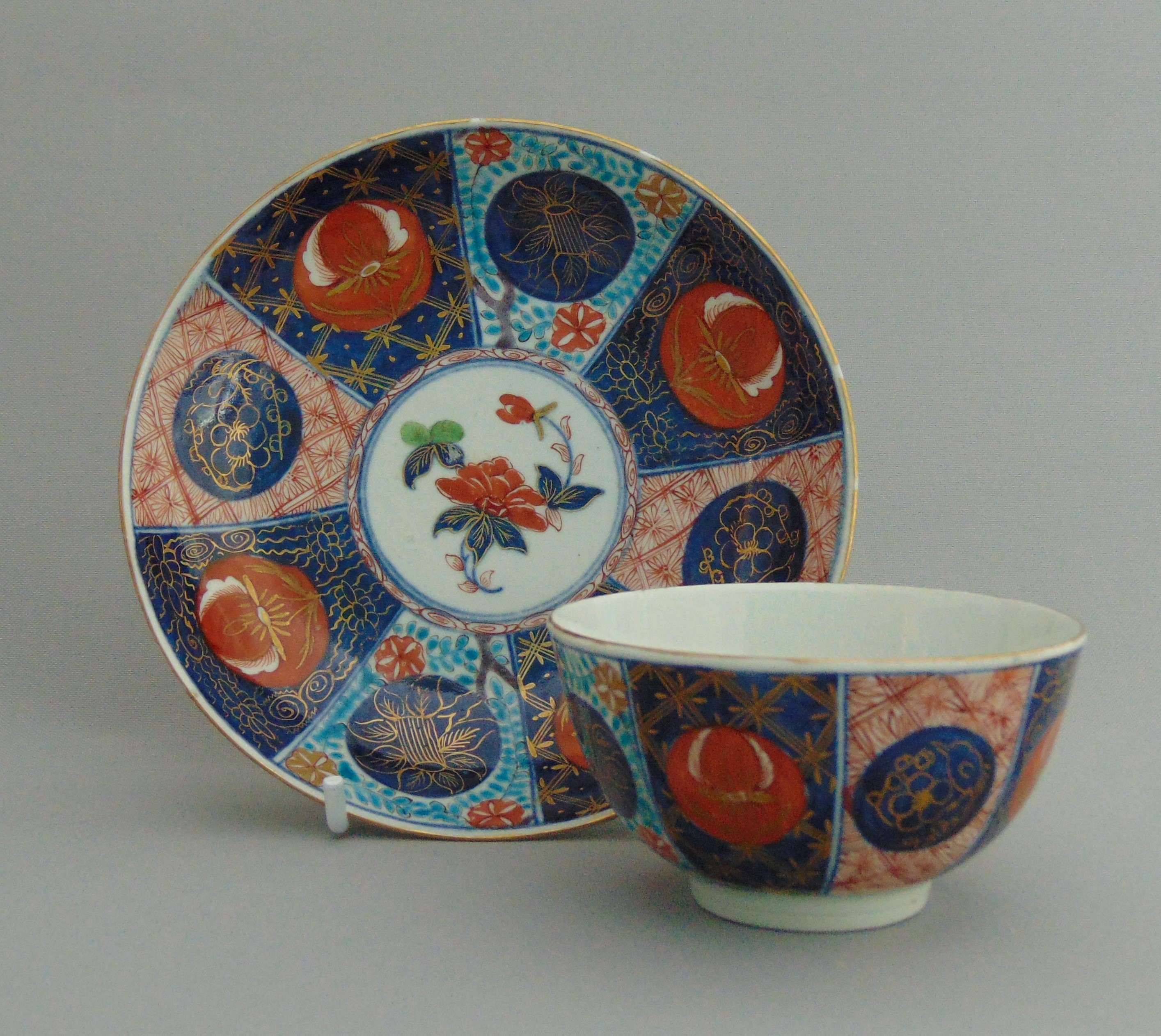 A Worcester tea bowl and saucer, decorated with 'Old Mosaic ' pattern, circa 1770,
