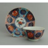 A Worcester tea bowl and saucer, decorated with 'Old Mosaic ' pattern, circa 1770,