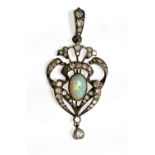 An opal and diamond set garland style drop pendant, the central opal approximately 10mm by 7mm,