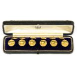 A presentation cased set of six 18ct gold dress studs, retailed by Wellby Jewellers, Garrick St,