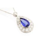 A tanzanite and diamond pear shaped white gold pendant and chain,