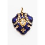 A Victorian diamond set blue enamelled pendant with a glazed compartment verso,