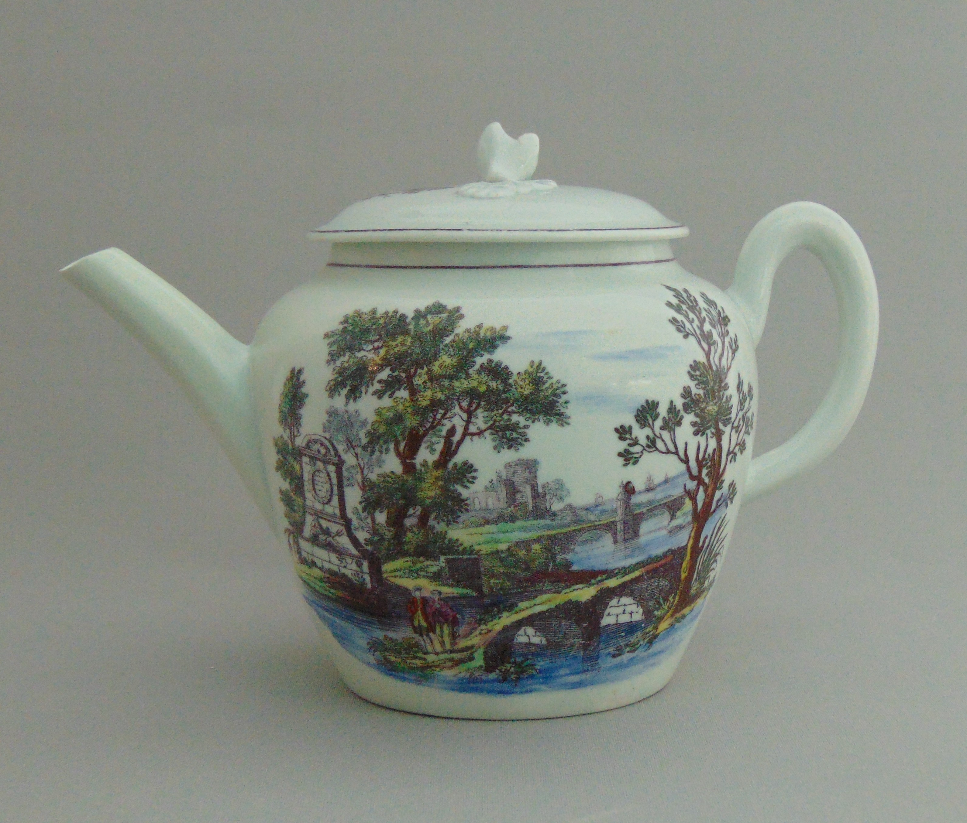 A rare Worcester teapot and cover printed in purple by Hancock with Sutton Hall to front and