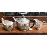 A three piece silver tea service, London 1894, maker Walter & John Barnard,