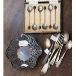 A silver Sheffield pierced pin dish, a cased set of six silver coffee spoons,