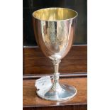 A hallmarked silver chalice, London, 1871, maker's mark ECB, silver gilt inside,