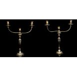 A pair of George III Old Sheffield plate three-light, two-branch candelabra,