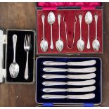 Boxed sets of EPNS spoons and tongs, child's EPNS spoon and fork, silver filled tea knife handles,