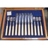 A cased set of fish knives and forks,
