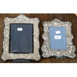 Two embossed silver photograph frames,