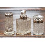 Three silver topped collared dressing table and cologne bottles (3)