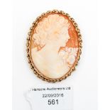 A 9 ct gold mounted oval cameo brooch with safety chain, clasp possibly resoldered, approx.