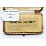 A 18 ct gold bar brooch, set with five old cut diamonds, with original case, from Sheffield,