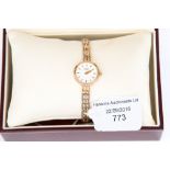 A 9 ct gold ladies' Rotary wristwatch on a 9 ct gold gate link bracelet,