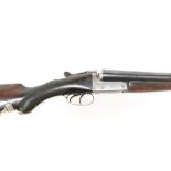 A 12 bore 2 1/2" chambered nitro proved side by side non ejector box lock shotgun.